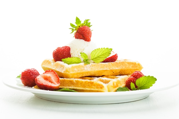 Sweet food - waffles with strawberry and ice cream