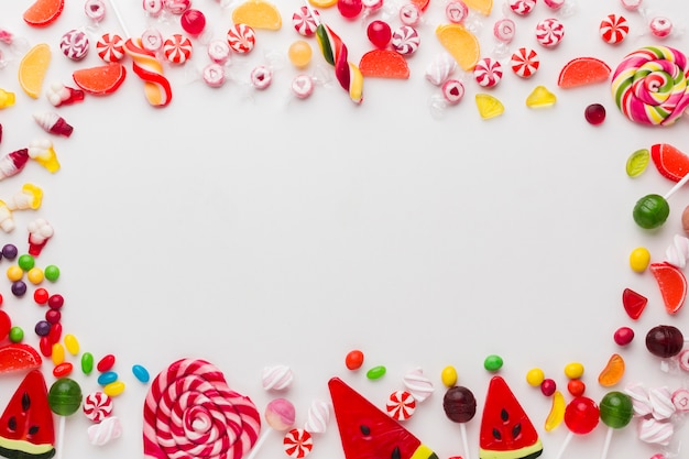 Photo sweet frame made of candies with copy space