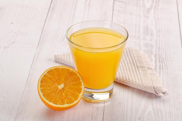 Sweet fresh orange juice in the glass