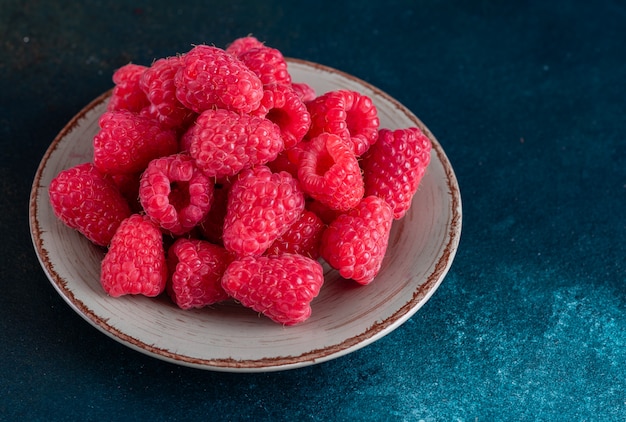 Sweet fresh organic raspberries 