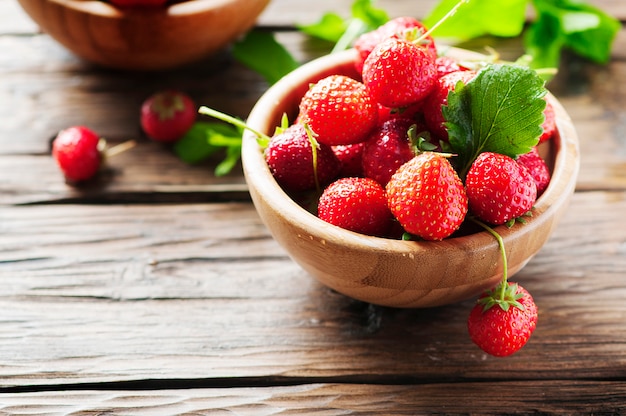 Sweet fresh strawberry on the wooden table