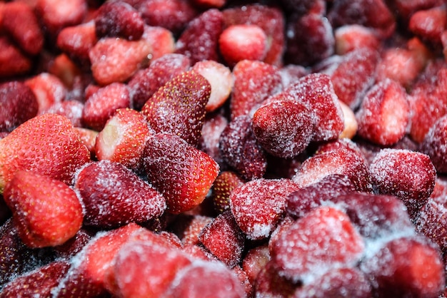 Sweet frozen strawberries as a texture