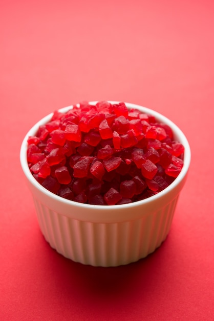 Sweet fruit candy also know as tutti-frutti, candied fruits\
served in a bowl used in masala pan in india or in cakes or\
sweets