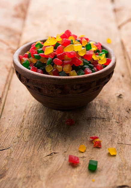 Sweet fruit candy also know as tutti-frutti, candied fruits\
served in a bowl used in masala pan in india or in cakes or\
sweets