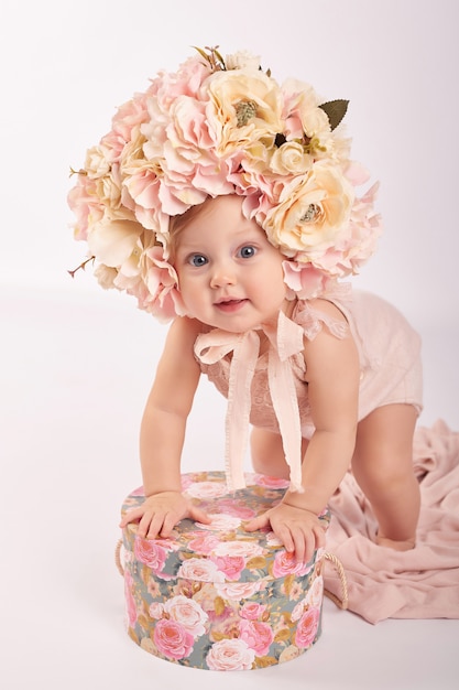 Sweet funny baby portrait with flowers