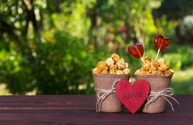 Sweet golden popcorn and lollipops