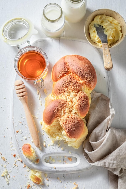 Sweet and homemade golden challah with honey and milk