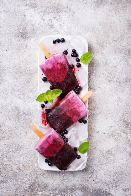 Sweet homemade popsicles with blueberry