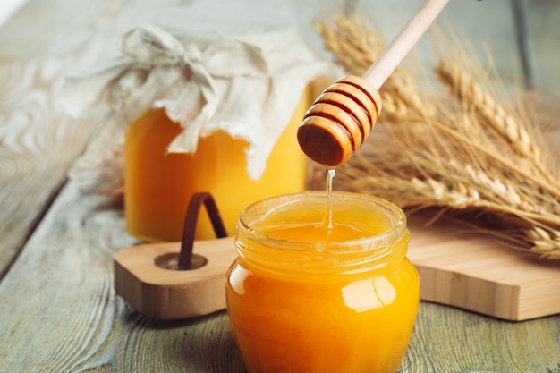 Sweet honey in glass jar.