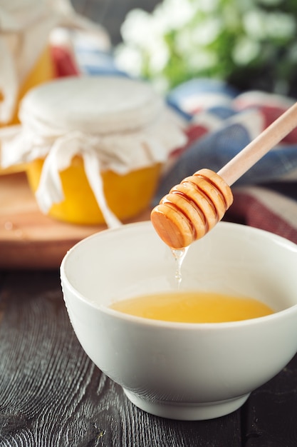 Sweet honey in glass jar.