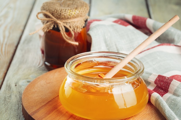 Sweet honey in glass jar.