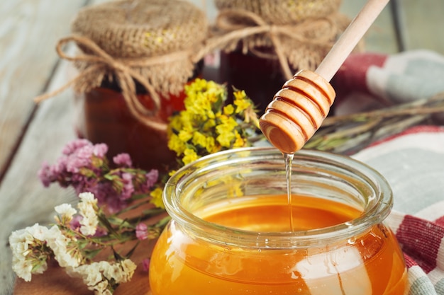 Sweet honey in glass jar.