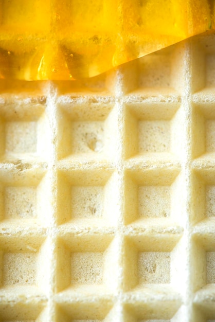 Sweet Honey Glaze on Waffel Sweet Food Texture Background