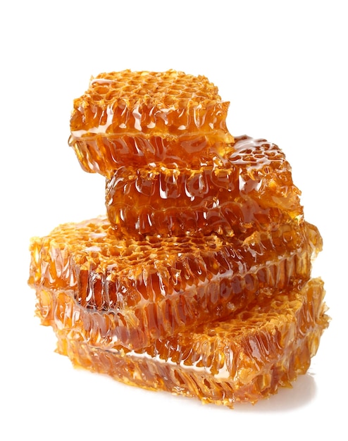 Sweet honeycombs with honey isolated on white