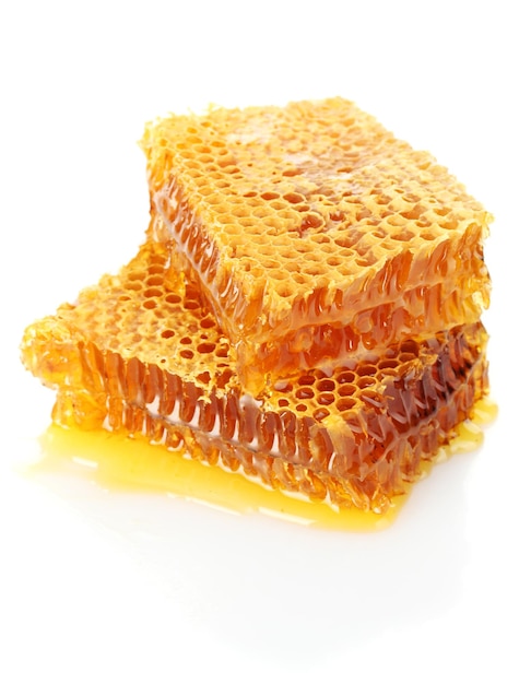 Sweet honeycombs with honey isolated on white