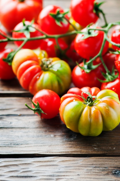 Sweet italian tomatoes on the wooden table