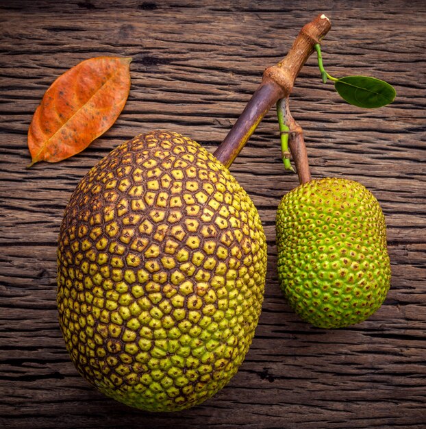 Sweet Jack fruit on shabby wooden background .