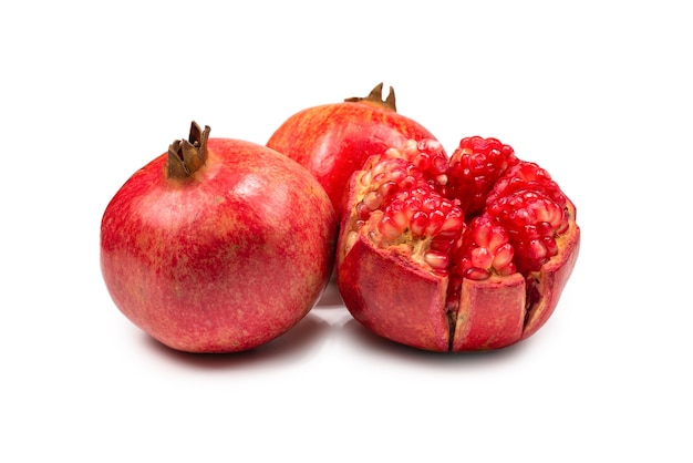 Sweet juicy pomegranate isolated on white background.