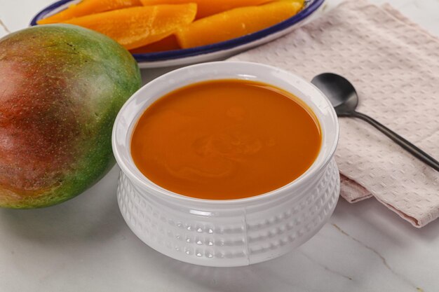 Sweet mango puree in the bowl