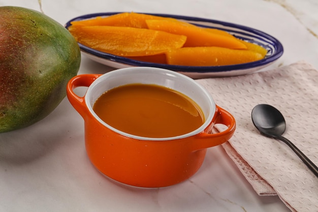 Sweet mango puree in the bowl