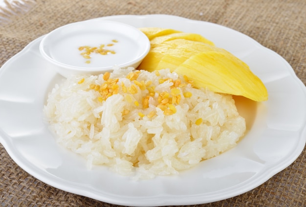 Sweet mango with sticky rice mix with coconut milk