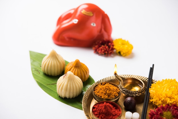 Sweet Modak food offered while Ganapati pooja or Ganesh puja