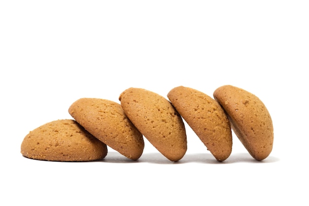 Sweet oatmeal cookies close-up isolated on white background