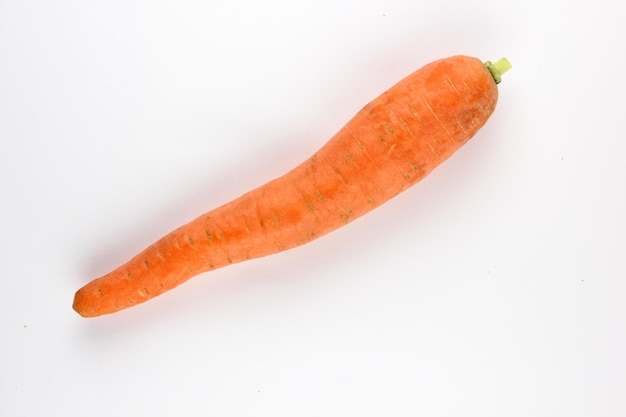 Sweet orange carrot isolated on white background Closeup of an orange vegetable Vegetable garden healthy food concept