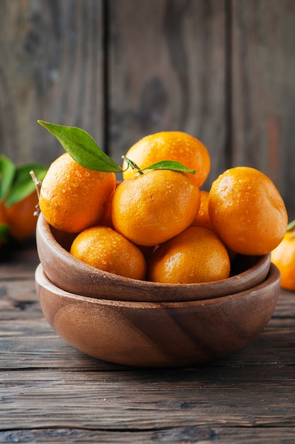 Sweet orange mandarin on the wooden table