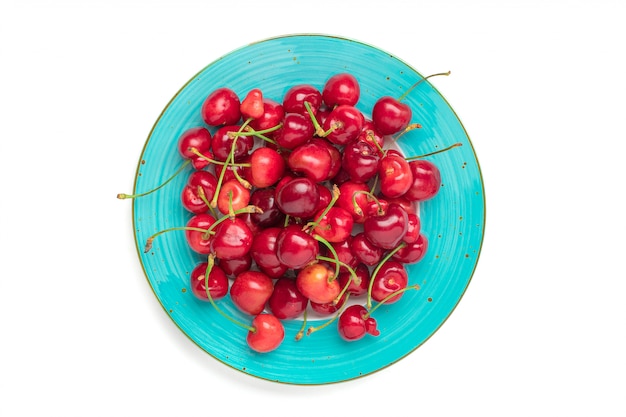 Sweet organic cherries on a plate