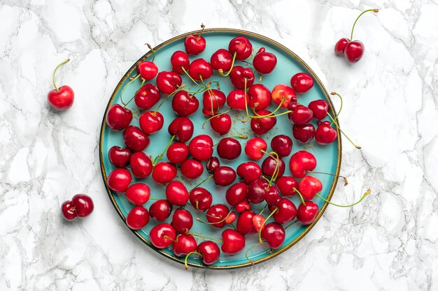 Sweet organic cherries on a plate