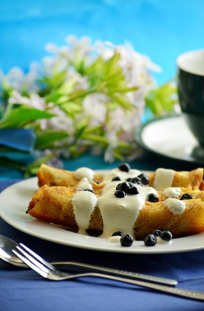 Sweet pancakes with cottage cheese and blueberries