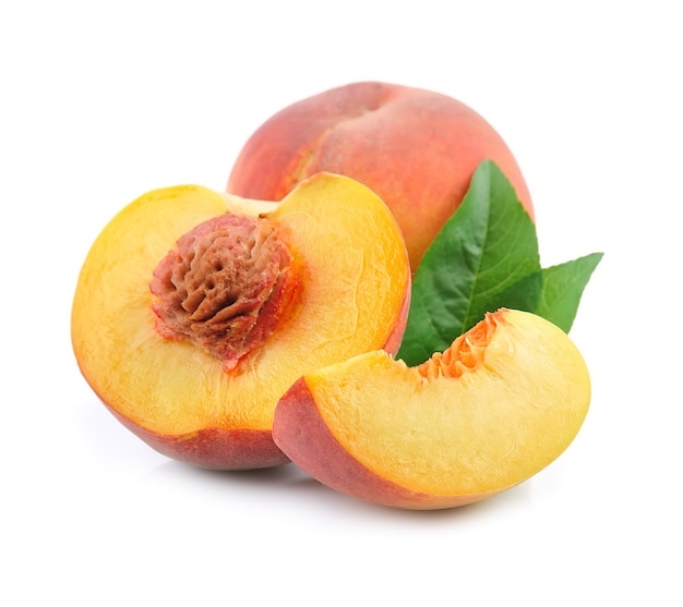 Sweet peach with leaves isolated