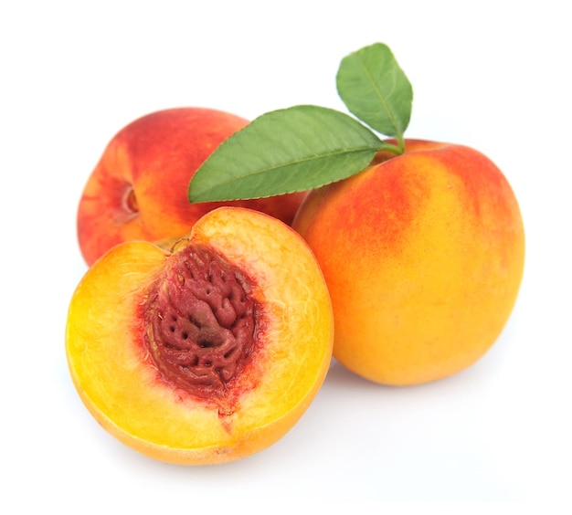 Sweet peaches with leafs