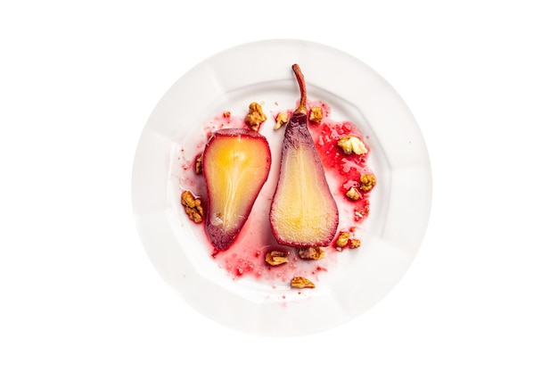 sweet pear in red wine dessert french cuisine healthy meal food snack diet on the table copy space