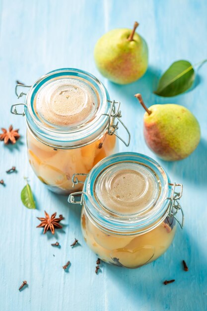 Sweet pickled pears with spices and sugar