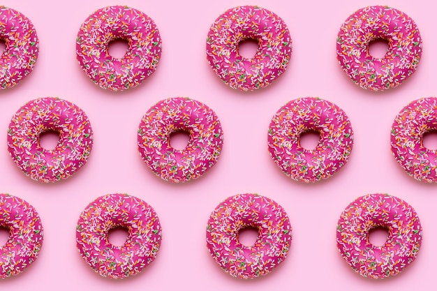 Sweet pink donut with multicolored sprinkles