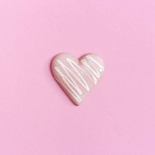 Sweet pink heart from chocolate. Love romantic concept. Minimal style with copy space. 