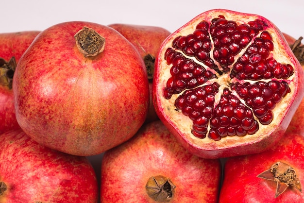 Sweet pomegranate isolated on white background.