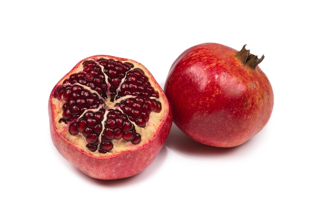 Sweet pomegranate isolated on white.