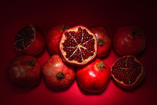 Sweet pomegranate on red background