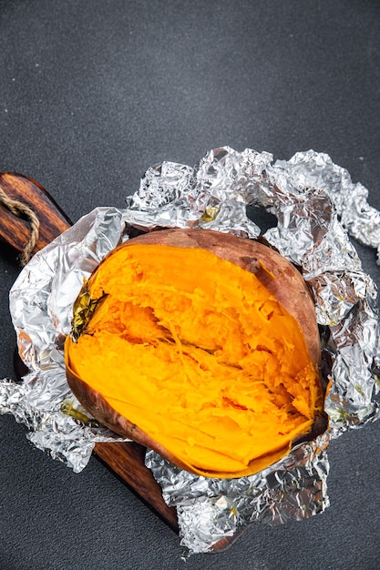 sweet potato baked vegetable healthy meal food snack on the table copy space food background