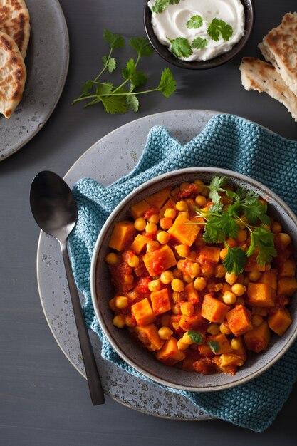 Sweet potato and chickpea curry with naan bread