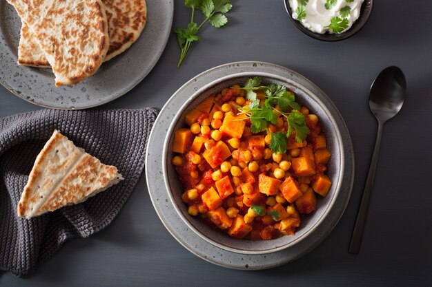 Sweet potato and chickpea curry with naan bread