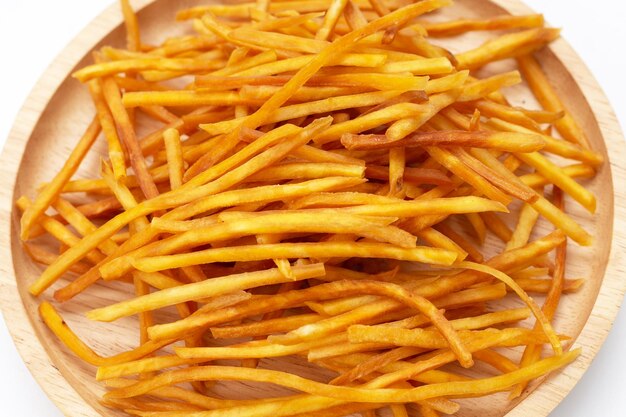 Sweet potato sticks on white background