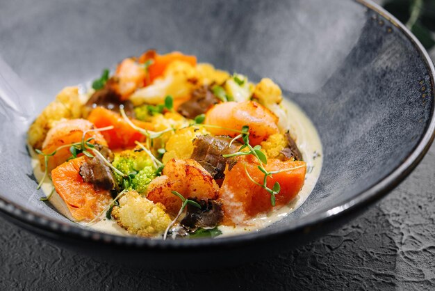 Photo sweet potato with shrimp and truffle sauce