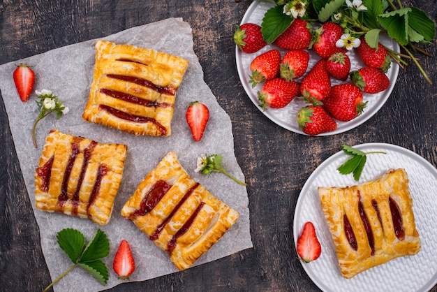 Sweet puff pastry cakes with strawberry