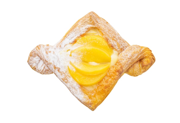 Sweet puff pastry with peaches cream and powdered sugar top view isolated on white background with clipping path