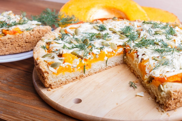 Sweet pumpkin pie with cheese and dill 