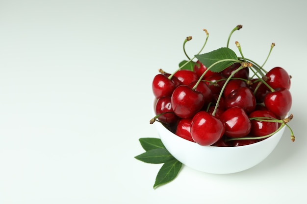 Sweet red cherry berries on white background